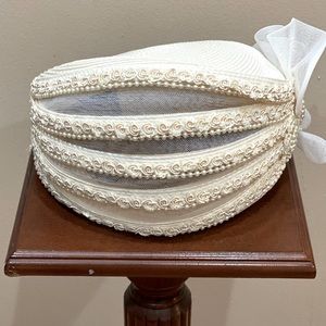 Deborah of New York cream rose hat.